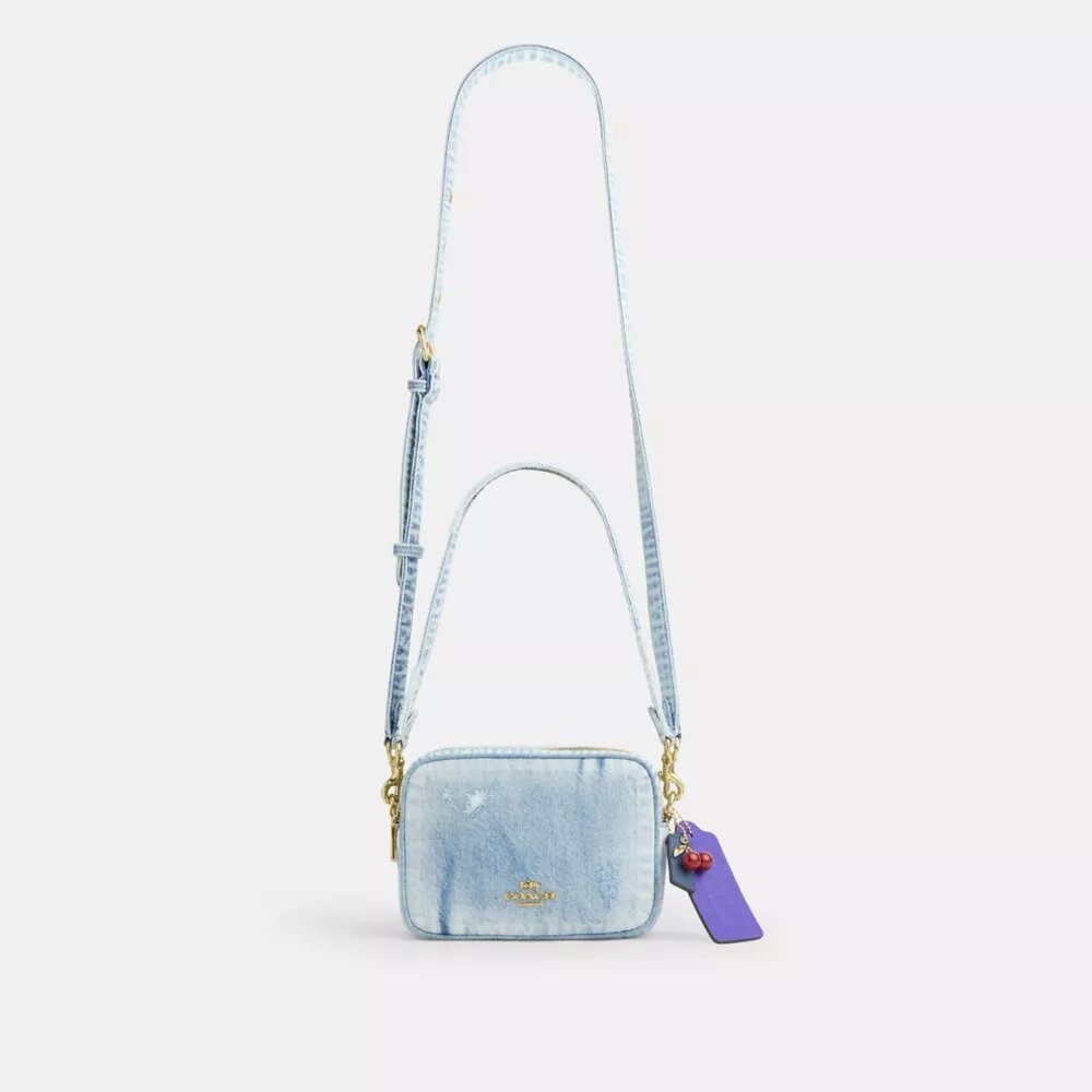 Mini sac bandoulière Carey en denim « Loved » avec Charms