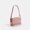 Mini sac bandoulière Carey en denim Signature