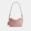 Mini sac bandoulière Carey en denim Signature