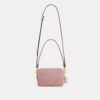 Mini sac bandoulière Carey en denim Signature