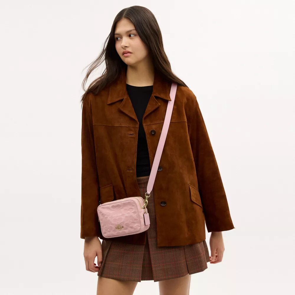 Mini sac bandoulière Carey en denim Signature