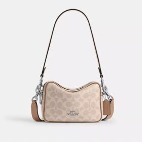 Mini sac bandoulière Carey en Signature Canvas