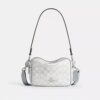 Mini sac bandoulière Carey en Signature Canvas