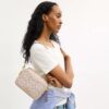 Mini sac bandoulière Carey en Signature Canvas