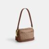 Mini sac bandoulière Carey en Signature Canvas