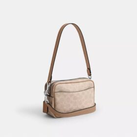 Mini sac bandoulière Carey en Signature Canvas