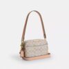 Mini sac bandoulière Carey en Signature Canvas
