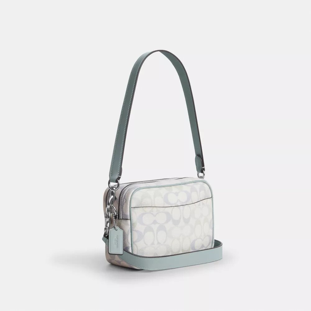 Mini sac bandoulière Carey en Signature Canvas