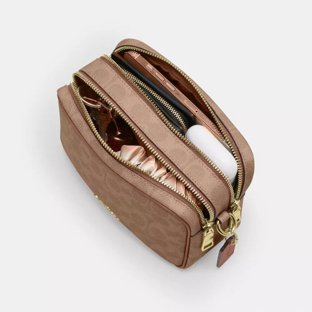 Mini sac bandoulière Carey en Signature Canvas