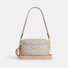 Mini sac bandoulière Carey en Signature Canvas