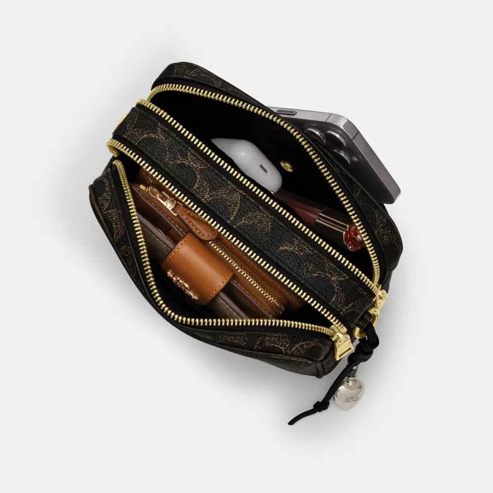 Mini sac à bandoulière Carey en Signature Canvas