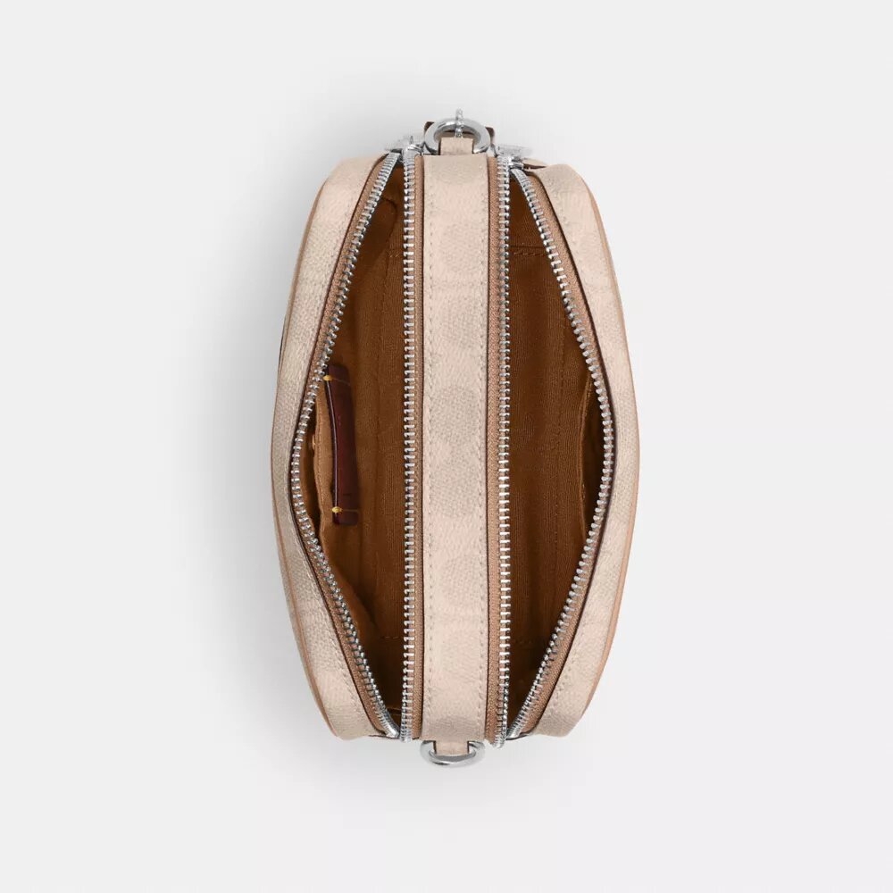 Mini sac bandoulière Carey en Signature Canvas