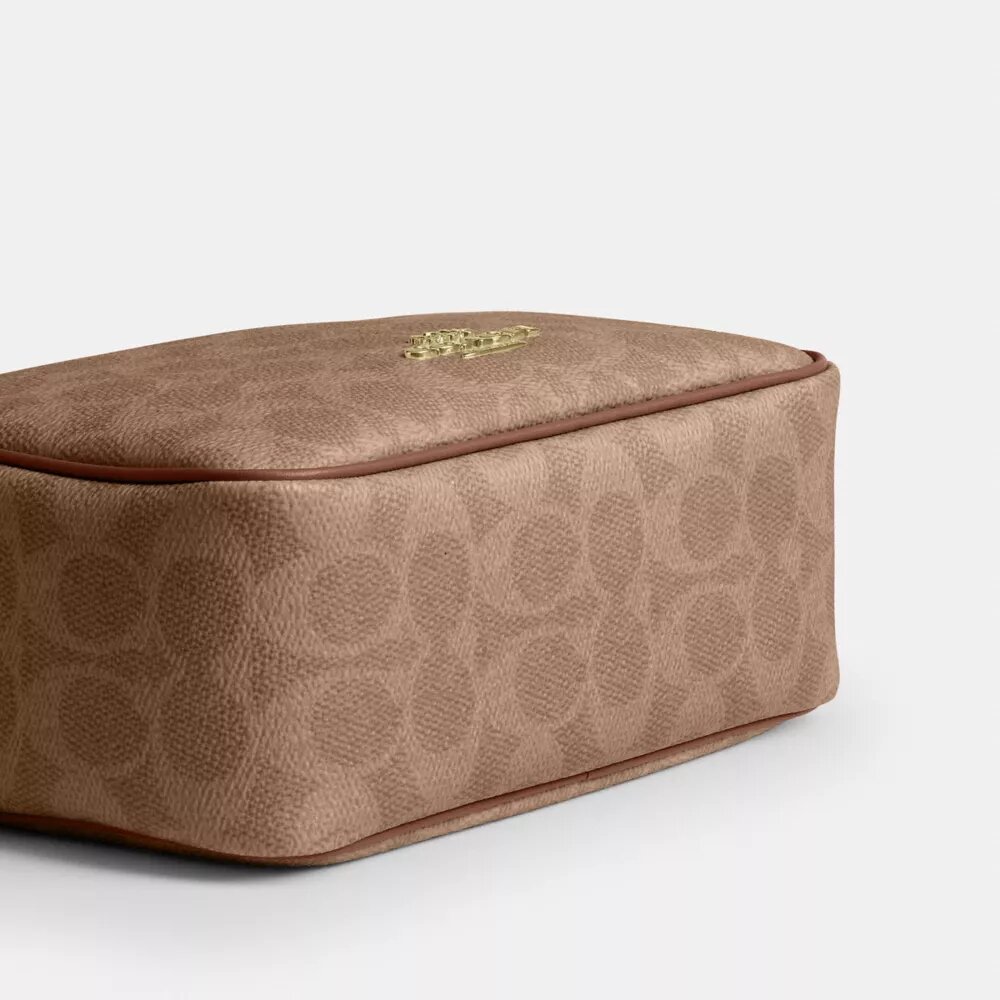 Mini sac bandoulière Carey en Signature Canvas