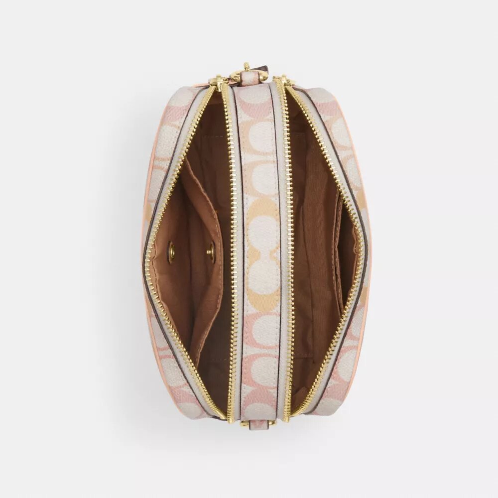 Mini sac bandoulière Carey en Signature Canvas