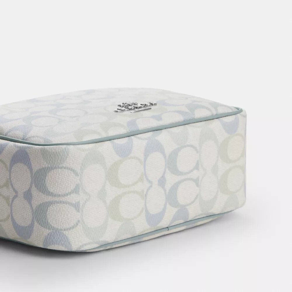 Mini sac bandoulière Carey en Signature Canvas
