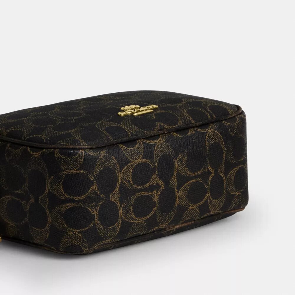 Mini sac à bandoulière Carey en Signature Canvas