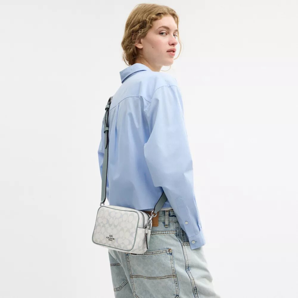Mini sac bandoulière Carey en Signature Canvas