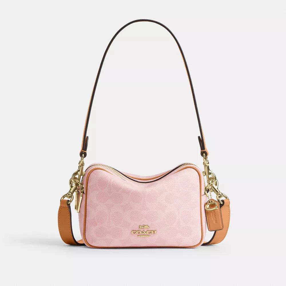 Mini sac bandoulière Carey en Signature Canvas avec Charms