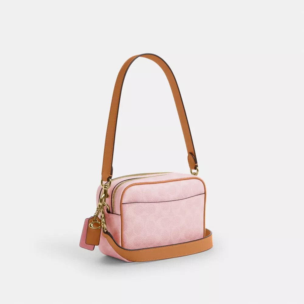 Mini sac bandoulière Carey en Signature Canvas avec Charms