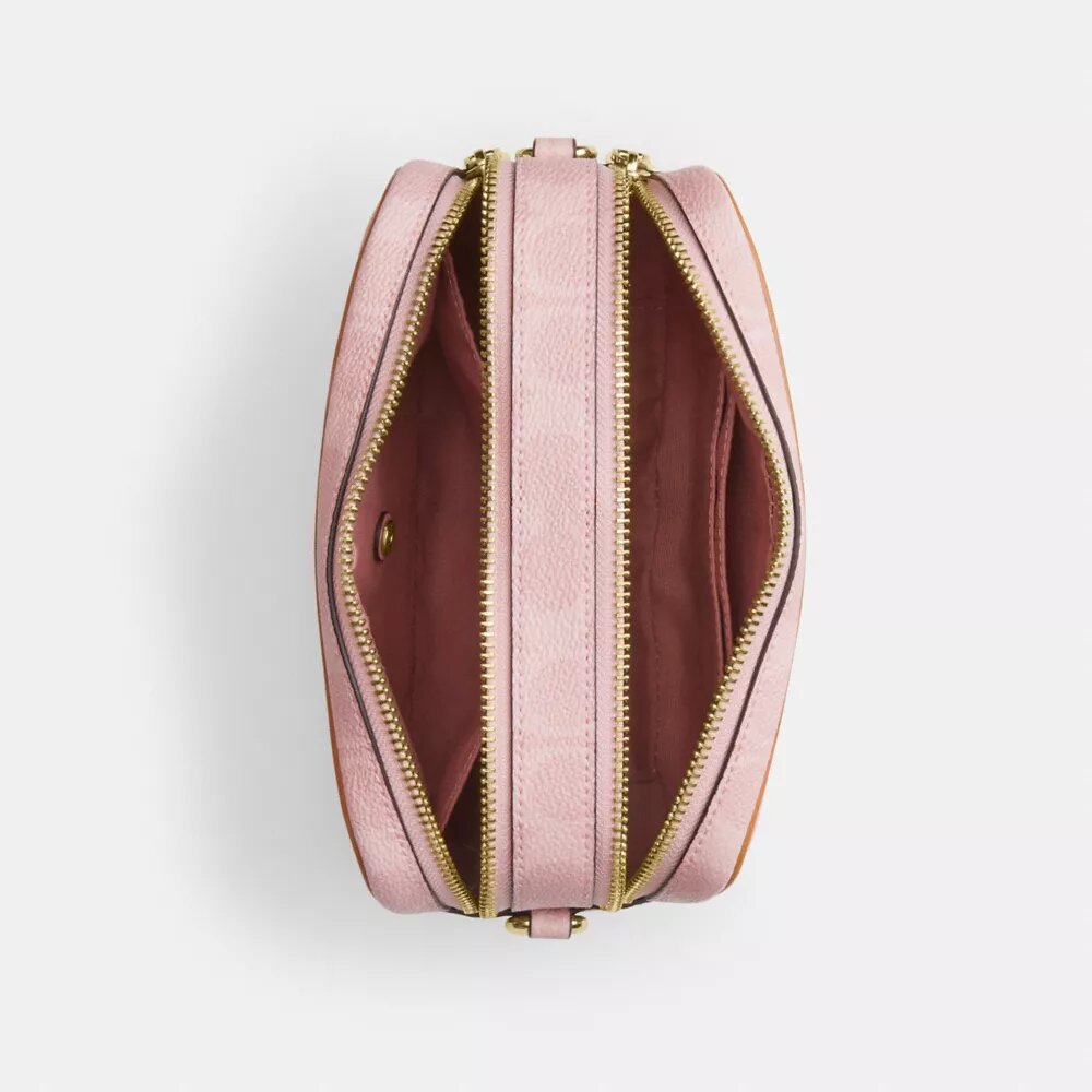 Mini sac bandoulière Carey en Signature Canvas avec Charms