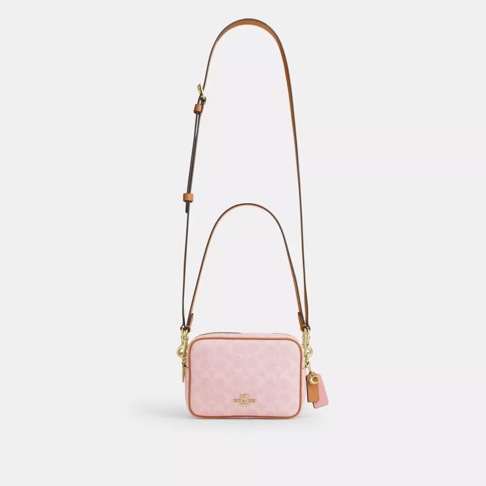 Mini sac bandoulière Carey en Signature Canvas avec Charms