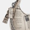 Mini-sac bandoulière Carmen avec imprimé journal