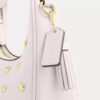 Mini-sac bandoulière Carmen avec rivets en forme de cœur