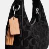 Mini sac bandoulière Carmen en denim emblématique