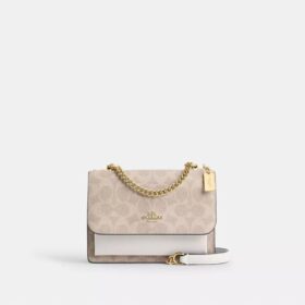 Mini sac bandoulière Klare en Signature Canvas