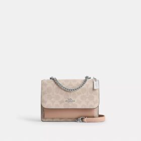 Mini sac bandoulière Klare en Signature Canvas