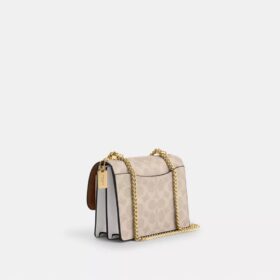 Mini sac bandoulière Klare en Signature Canvas