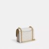 Mini sac bandoulière Klare en Signature Canvas