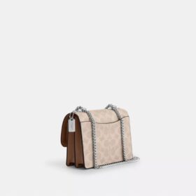 Mini sac bandoulière Klare en Signature Canvas