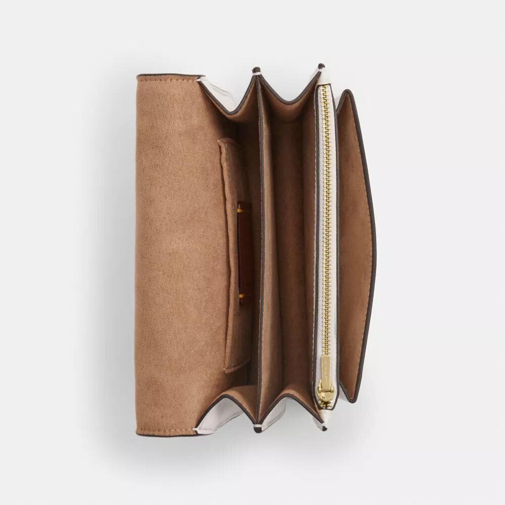 Mini sac bandoulière Klare en Signature Canvas