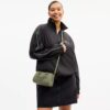 Mini sac bandoulière Rowan en cuir Signature