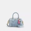 Mini sac bandoulière Rowan en denim usé avec Charms