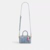 Mini sac bandoulière Rowan en denim usé avec Charms