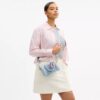 Mini sac bandoulière Rowan en denim usé avec Charms