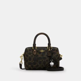 Mini sac bandoulière Rowan en Signature Canvas avec Charms