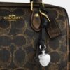 Mini sac bandoulière Rowan en Signature Canvas avec Charms