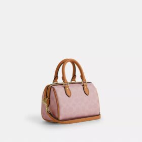 Mini sac bandoulière Rowan en Signature Canvas avec Charms