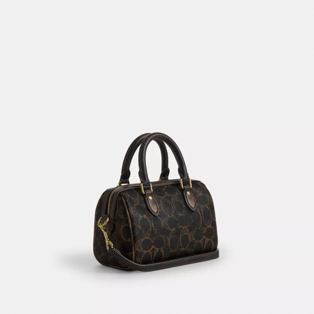 Mini sac bandoulière Rowan en Signature Canvas avec Charms