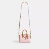 Mini sac bandoulière Rowan en Signature Canvas avec Charms