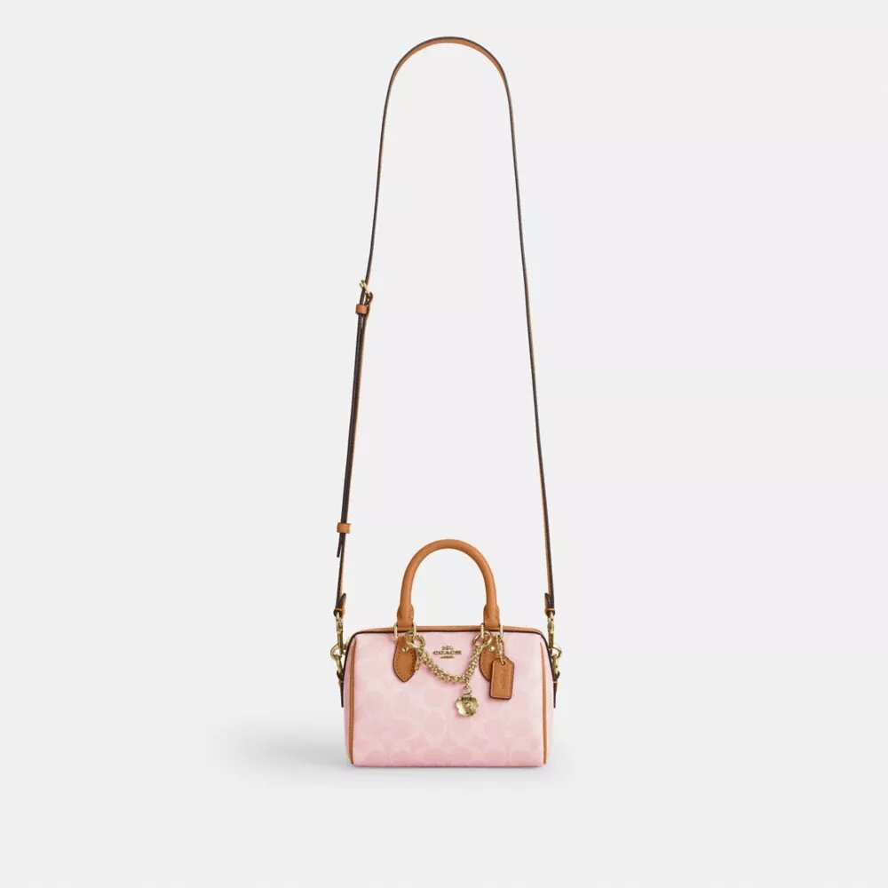 Mini sac bandoulière Rowan en Signature Canvas avec Charms