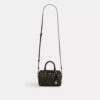 Mini sac bandoulière Rowan en Signature Canvas avec Charms