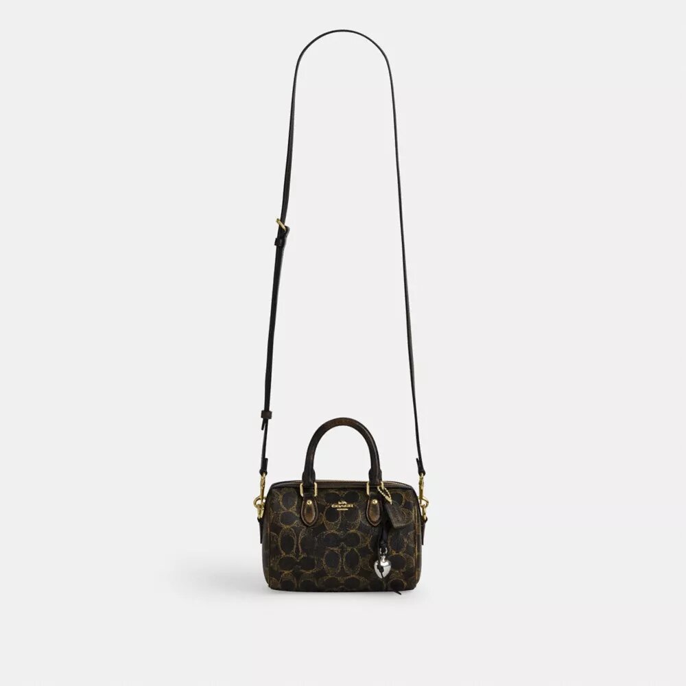 Mini sac bandoulière Rowan en Signature Canvas avec Charms