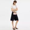 Mini sac bandoulière Rowan en Signature Canvas avec Charms