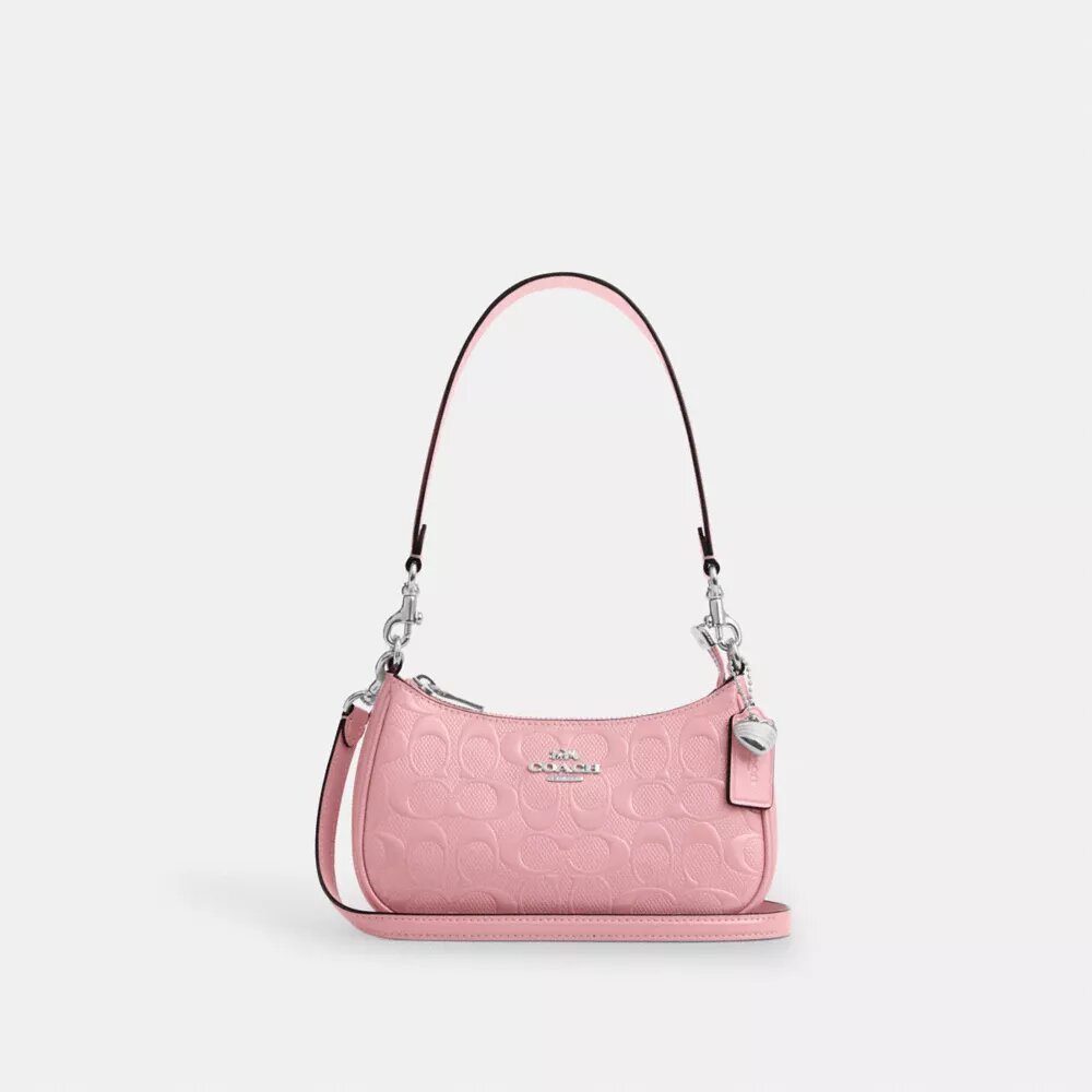 Mini sac bandoulière Teri en cuir emblématique avec breloque en forme de cœur