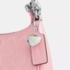Mini sac bandoulière Teri en cuir emblématique avec breloque en forme de cœur