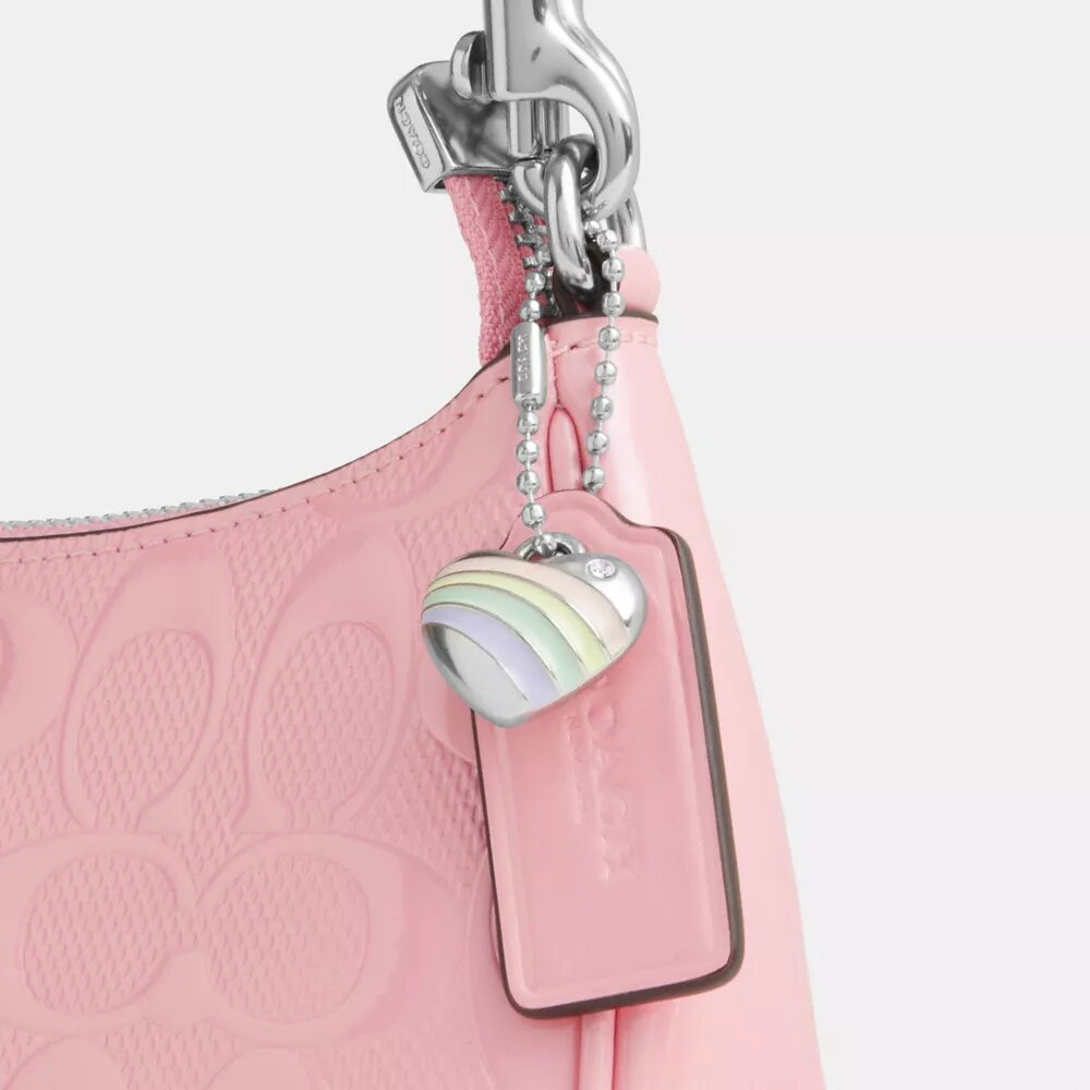 Mini sac bandoulière Teri en cuir emblématique avec breloque en forme de cœur